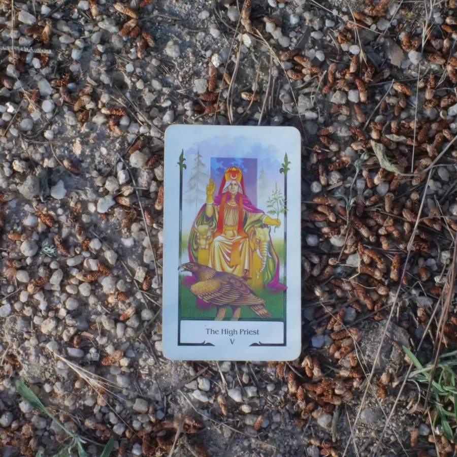 The The Hierophant tarot card photographed outdoors