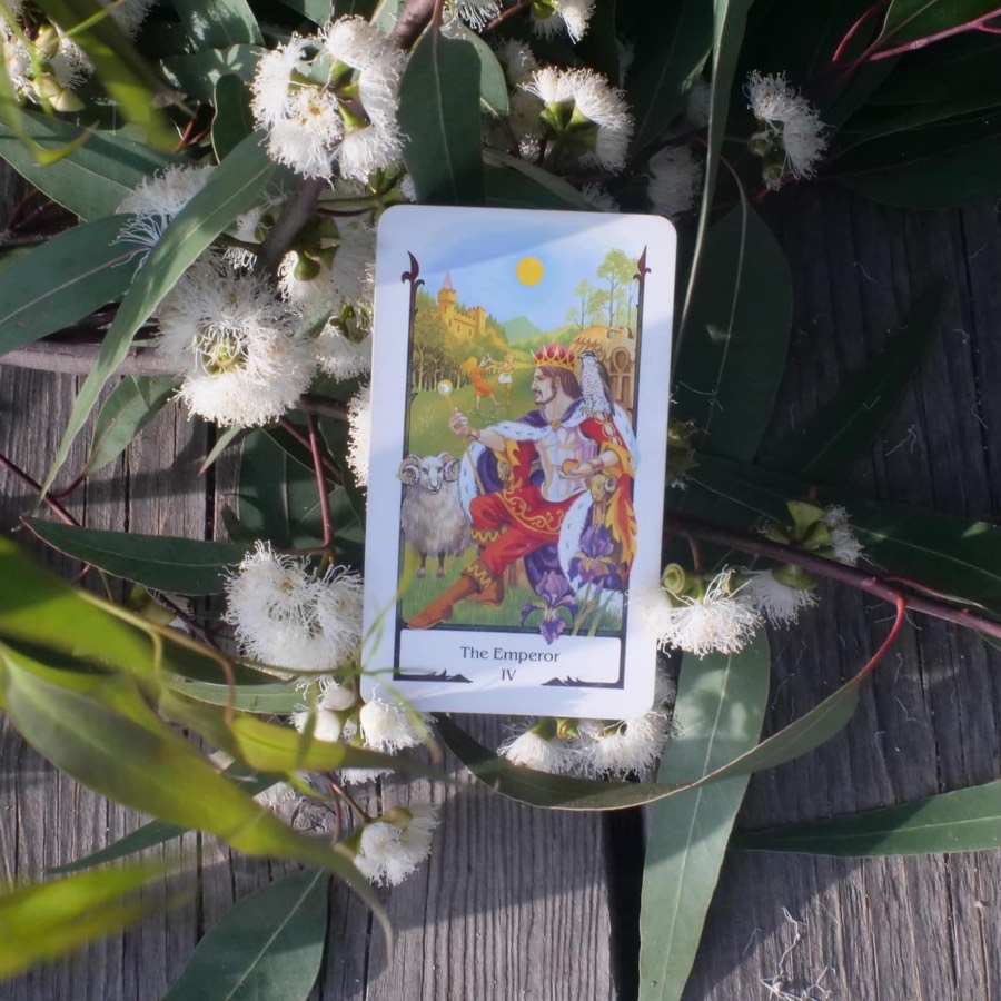 The The Emperor tarot card photographed outdoors